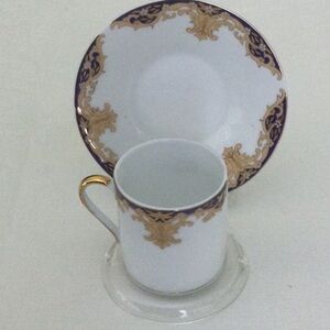 Demitasse Cup and Saucer made in China very pretty design gold white & blue